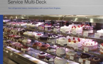 KBC-D non-refrigerated service multi-deck bakery merchandiser with curved front-lift glass.
